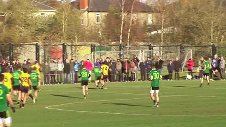 Michael Murphy Swats A Queens University Player Off The Ball (GIF).