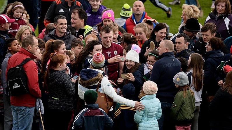 16 April 2017; Aisling Magner, from Ashford, left, and Niamh Mullins, from Ardagh, Co Limerick, simultaneously take a selfie with Joe Canning of Galway after the Allianz Hurling League Division 1 Semi-Final match between Limerick and Galway at the Gaelic Grounds in Limerick. Photo by Diarmuid Greene/Sportsfile