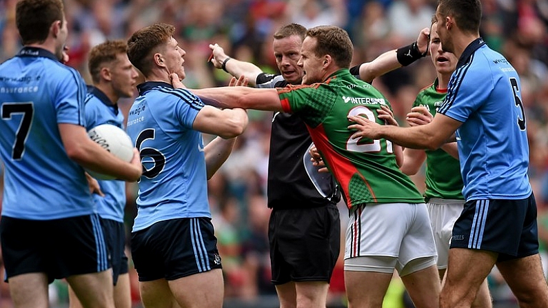 30 August 2015; John Small, Dublin, gets involved in an altercation with Andy Moran, Mayo, as referee Joe McQuillan signals for a penalty for Mayo. GAA Football All-Ireland Senior Championship, Semi-Final, Dublin v Mayo, Croke Park, Dublin. Picture credit: Paul Mohan / SPORTSFILE