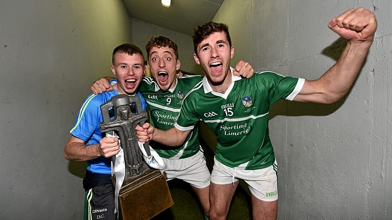 12 September 2015; Limerick's Dean Coleman, Pat Ryan, and Barry Nash celebrate with the Cross of Cashel trophy after victory over Wexford. Bord Gais Energy GAA Hurling All-Ireland U21 Championship Final, Limerick v Wexford, Semple Stadium, Thurles, Co. Tipperary. Picture credit: Diarmuid Greene / SPORTSFILE