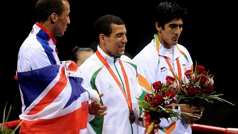 23 August 2008; Medal winners James Degale, gold, Great Britain, Darren Sutherland, bronze, Ireland, and Vijendar Kumar, silver, India, after the medal presentation for the final of the Middleweight, 75kg, division. Beijing 2008 - Games of the XXIX Olympiad, Beijing Workers' Gymnasium, Olympic Green, Beijing, China. Picture credit: Ray McManus / SPORTSFILE