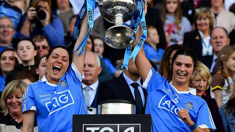 24 September 2017; Sinead Goldrick, left, and Niamh Collins of Dublin lift the Brendan Martin Cup after the TG4 Ladies Football All-Ireland Senior Championship Final match between Dublin and Mayo at Croke Park in Dublin. Photo by Brendan Moran/Sportsfile