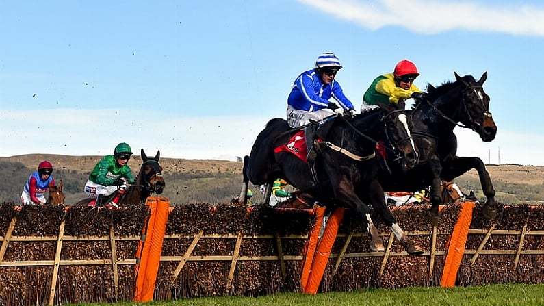 15 March 2018; Penhill, left, with Paul Townend up, jumps the last alongside Supasundae, with Robbie Power up, who finished second, on their way to winning the Sun Bets Stayers' Hurdle on Day Three of the Cheltenham Racing Festival at Prestbury Park in Cheltenham, England. Photo by Ramsey Cardy/Sportsfile