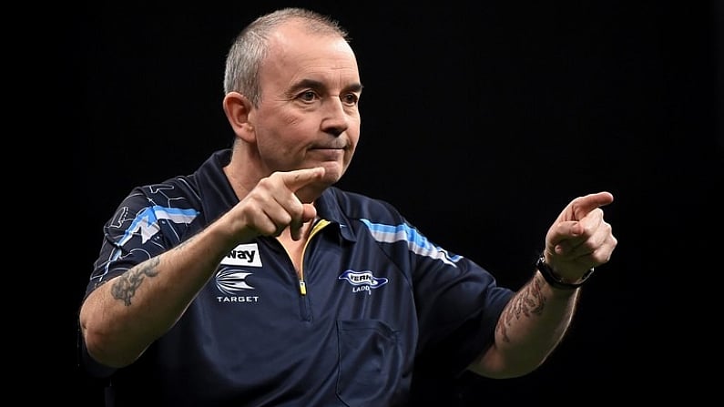 26 March 2015; Phil Taylor competes against Kim Huybrechts during the Betway Premier League Darts at the 3Arena, Dublin. Picture credit: Stephen McCarthy / SPORTSFILE