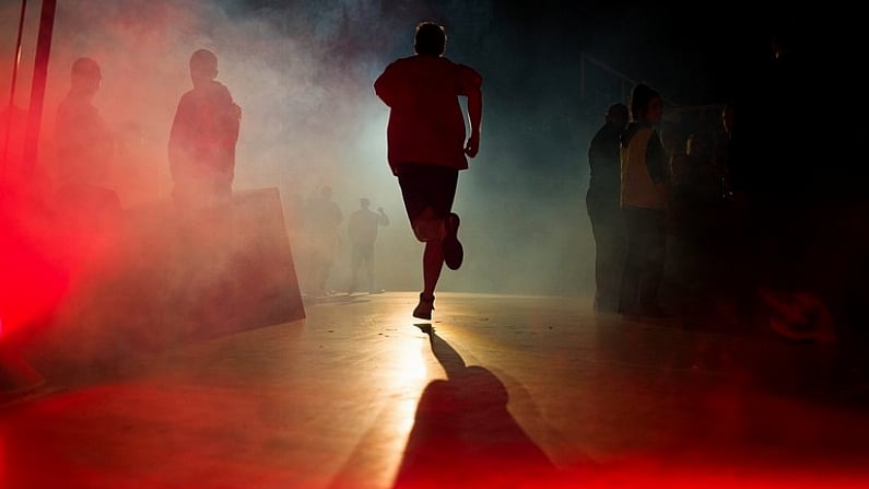 24 January 2014; The C&S UCC Demons team run out onto the court before the game. Basketball Ireland National Men's Senior Cup Final, C&S UCC Demons, Cork v Dublin Inter, National Basketball Arena, Tallaght, Co. Dublin. Picture credit: Brendan Moran / SPORTSFILE