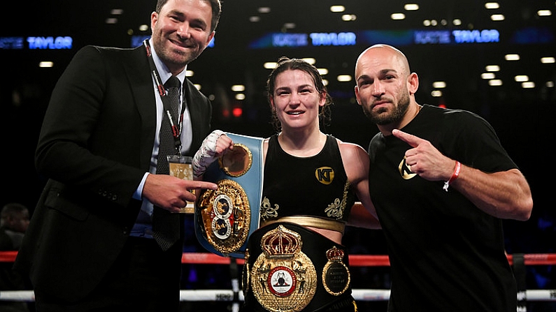 28 April 2018; Katie Taylor celebrates with promoter Eddie Hearn, left, and trainer Ross Enamait, right, following her WBA and IBF World Lightweight unification bout with Victoria Bustos at the Barclays Center in Brooklyn, New York. Photo by Stephen McCarthy/Sportsfile