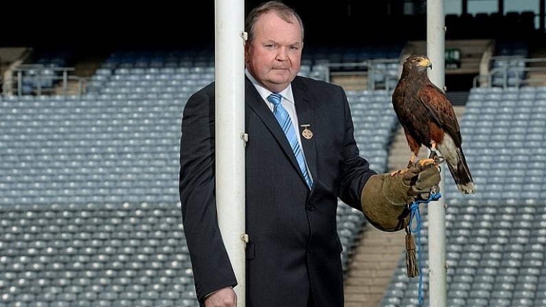 22 April 2013; Uachtaran Chumann Luthchleas Gael Liam O Neill is joined by Tom, the Harris Hawk, to announce Specsavers' sponsorship of the new Hawkeye point detection technology for both hurling and football at Croke Park. The new system, which will be first utilised on 1st June at the Leinster GAA Football Senior Championship quarter-final double header, provides real time imagery on the stadium's big screen of a ball's trajectory over the posts to remove any ambiguity over whether a point was scored or missed. Specsavers sponsorship will now mean that any tricky point decision can be made quickly avoiding any 'Should've gone to Specsavers' moments for match officials. Croke Park, Dublin. Picture credit: Paul Mohan / SPORTSFILE