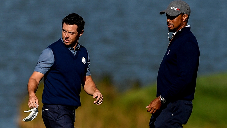 30 September 2016 Rory McIlroy of Europe and USA vice-captain Tiger Woods on the 9th hole during the afternoon Fourball Match against Dustin Johnson and Matt Kuchar of USA at The 2016 Ryder Cup Matches at the Hazeltine National Golf Club in Chaska, Minnesota, USA. Photo by Ramsey Cardy/Sportsfile