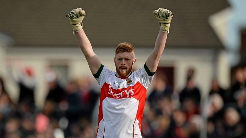 30 April 2016; Mayo goalkeeper Mattie Flanagan celebrates his side's first goal, scored by team-mate Diarmuid O'Connor. EirGrid GAA Football Under 21 All-Ireland Championship Final, Cork v Mayo. Cusack Park, Ennis, Co. Clare. Picture credit: Piaras O Midheach / SPORTSFILE