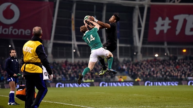 19 November 2016; Andrew Trimble of Ireland and Julian Savea of New Zealand contest a high ball during the Autumn International match between Ireland and New Zealand at the Aviva Stadium in Dublin. Photo by Brendan Moran/Sportsfile