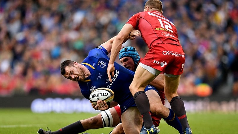 26 May 2018; Cian Healy of Leinster is tackled by Tadhg Beirne, behind, and Hadleigh Parkes of Scarlets during the Guinness PRO14 Final between Leinster and Scarlets at the Aviva Stadium in Dublin. Photo by Ramsey Cardy/Sportsfile