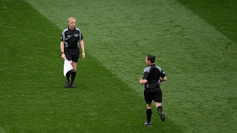 9 April 2017; Referee Paddy Neilan runs over to talk to linesman Ciaran Branagan, left,  during the Allianz Football League Division 1 Final match between Dublin and Kerry at Croke Park, in Dublin. Photo by Ray McManus/Sportsfile