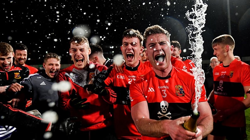 20 February 2019; Kevin Flahive of UCC celebrates with champagne after the Electric Ireland HE GAA Sigerson Cup Final match between St Mary's University College Belfast and University College Cork at O'Moore Park in Portlaoise, Laois. Photo by Piaras O Midheach/Sportsfile