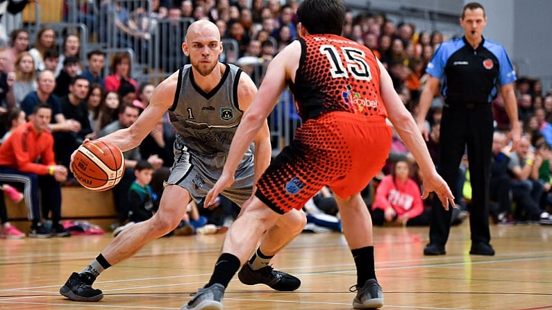 12 January 2019; Paul Dick of Garvey's Tralee Warriors in action against Ciaran Roe of Pyrobel Killester during the Hula Hoops Mens Pat Duffy National Cup semi-final match between Pyrobel Killester and Garveys Tralee Warriors at the Mardyke Arena UCC in Cork. Photo by Brendan Moran/Sportsfile