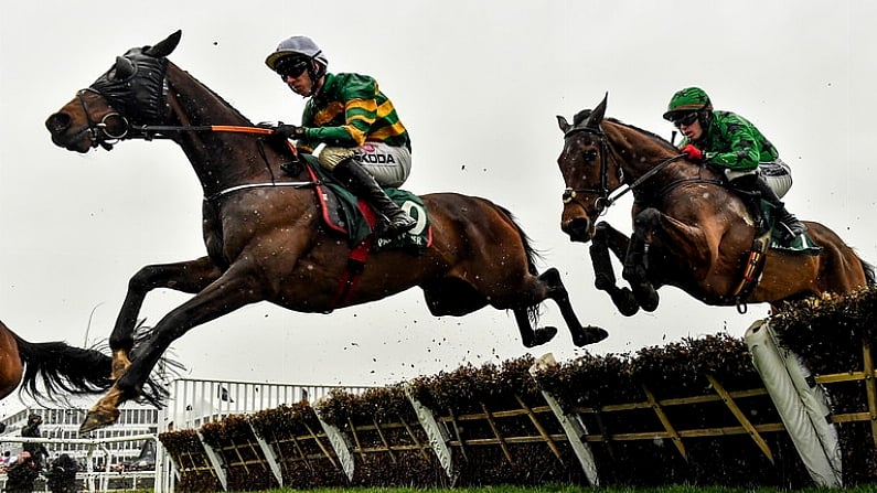 16 March 2023; Sire Du Berlais, left, with Mark Walsh up, jumps the last during the first circuit on their way to winning the Paddy Power Stayers' Hurdle during day three of the Cheltenham Racing Festival at Prestbury Park in Cheltenham, England. Photo by Seb Daly/Sportsfile