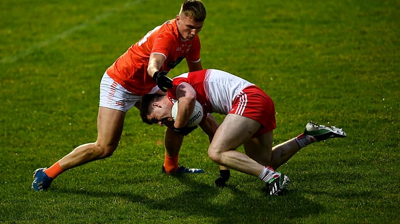 1 November 2020; Padraig McGrogan of Derry in action against Rian O'Neill of Armagh during the Ulster GAA Football Senior Championship Quarter-Final match between Derry and Armagh at Celtic Park in Derry. Photo by David Fitzgerald/Sportsfile