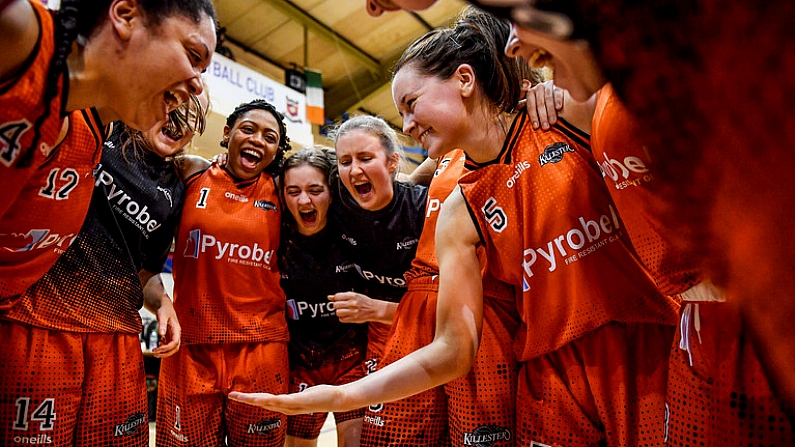 11 January 2020; Pyrobel Killester players, led by Rebecca Nagle  #5, celebrate after the Hula Hoops Women's Paudie O'Connor National Cup Semi-Final match between Ambassador UCC Glanmire and Pyrobel Killester at Neptune Stadium in Cork. Photo by Brendan Moran/Sportsfile