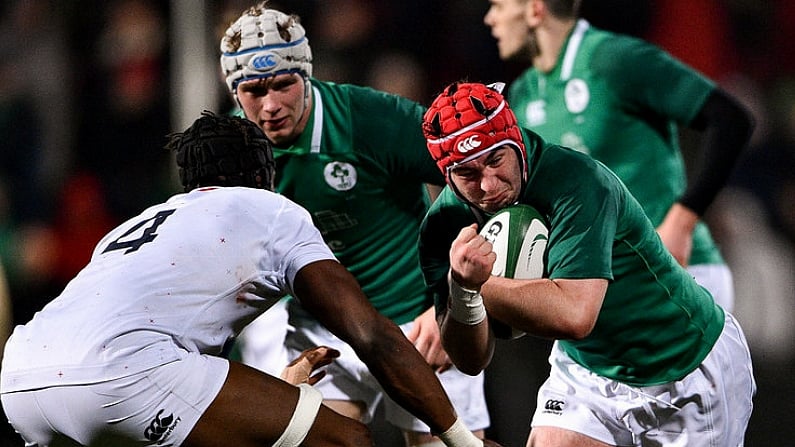 1 February 2019; John Hodnett of Ireland is tackled by Joel Kpoku of England during the U20 Six Nations Rugby Championship match between Ireland and England at Irish Independent Park in Cork. Photo by Matt Browne/Sportsfile