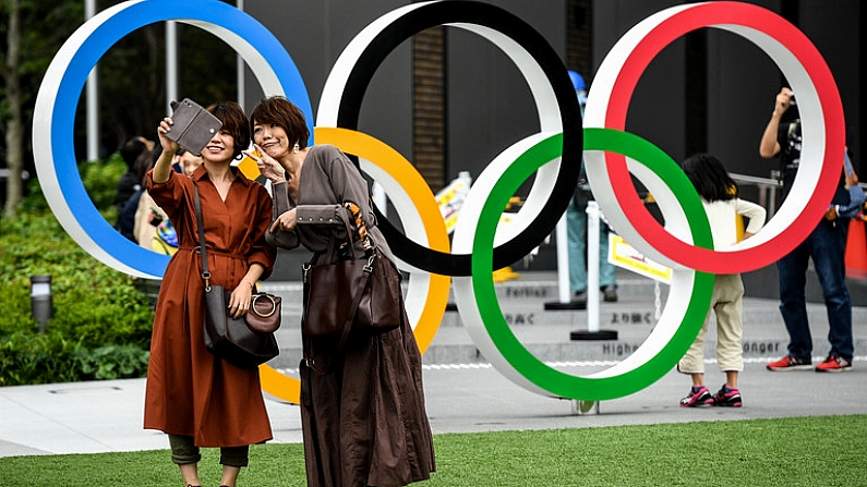 21 October 2019; Locals take a selfie outside the Japanese Olympic Museum in Shinjuku City. The Tokyo 2020 Games of the XXXII Olympiad take place from Friday 24th July to Sunday 9th August 2020 in Tokyo, Japan, the second Summer Olympics Games to be held in Tokyo, the first being 1964. Photo by Ramsey Cardy/Sportsfile