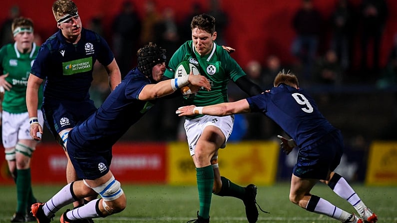 31 January 2020; Hayden Hyde of Ireland is tackled by Cameron Henderson, left, and Roan Frostwick of Scotland during the U20 Six Nations Rugby Championship match between Ireland and Scotland at Irish Independent Park in Cork. Photo by Harry Murphy/Sportsfile