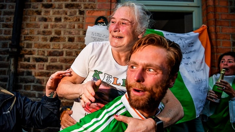 8 August 2021; Kellie Harrington's mother Yvonne and brother Chirstopher celebrate after her Tokyo 2020 Olympics lightweight final bout, against Beatriz Ferreira of Brazil, from home at Portland Row in Dublin. Photo by Ray McManus/Sportsfile