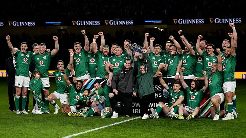 19 March 2022; James Ryan and Andrew Conway lift the Triple Crown trophy as the Ireland team celebrate after the Guinness Six Nations Rugby Championship match between Ireland and Scotland at Aviva Stadium in Dublin. Photo by Brendan Moran/Sportsfile