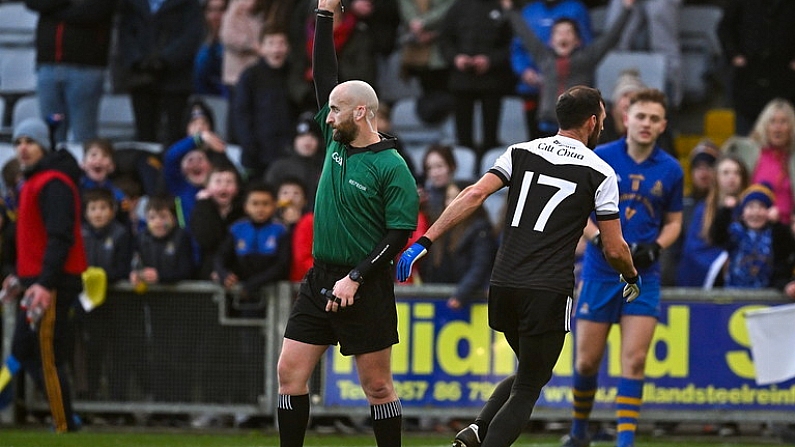 29 January 2022; Referee Brendan Cawley shows a red card to Aidan Branagan of Kilcoo during the AIB GAA Football All-Ireland Senior Club Championship Semi-Final match between St Finbarr's, Cork, and Kilcoo, Down, at MW Hire O'Moore Park in Portlaoise, Laois. Photo by Brendan Moran/Sportsfile