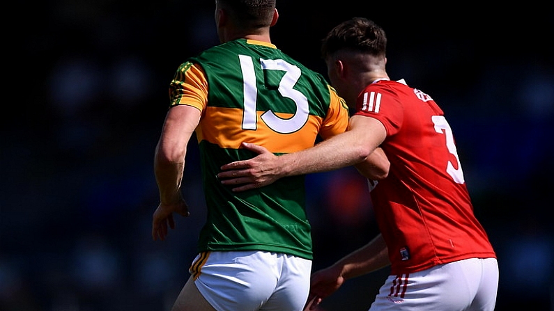 25 July 2021; David Clifford of Kerry is marked tightly by Sean Meehan of Cork during the Munster GAA Football Senior Championship Final match between Kerry and Cork at Fitzgerald Stadium in Killarney, Kerry. Photo by Piaras O Midheach/Sportsfile