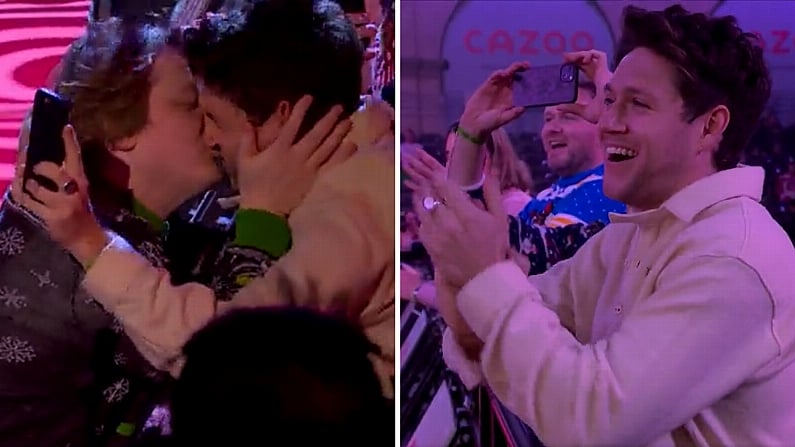 Lewis Capaldi Plants A Kiss On Niall Horan At World Darts Championship