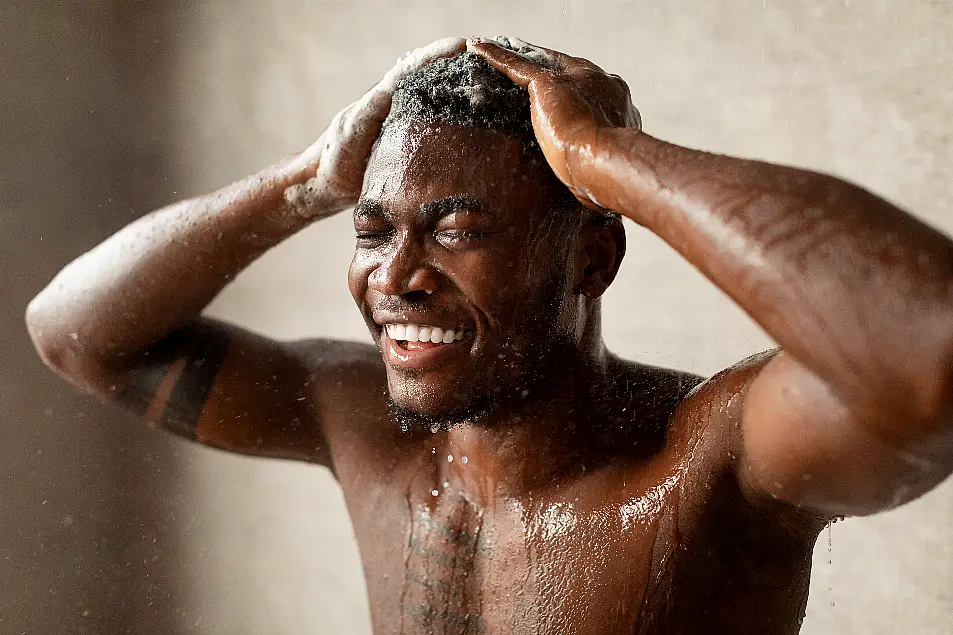 Man washing his hair