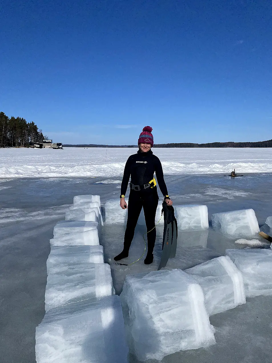 TV presenter Louise Minchin free-diving under ice in Finland (Bloomsbury Sport/PA)