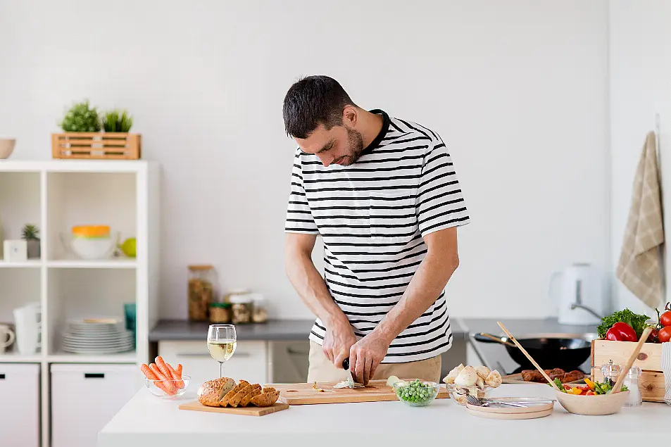 man cooking at home