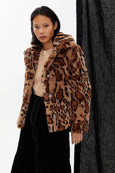 Oliver Bonas Natural Animal Fur Coat; Corduroy Button Through Black Tiered Midi Skirt; Antwerp Aran Neutral Jumper