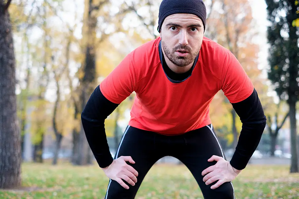 Man in running gear outdoors