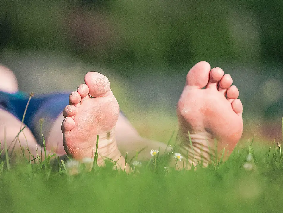 Bare feet on the grass