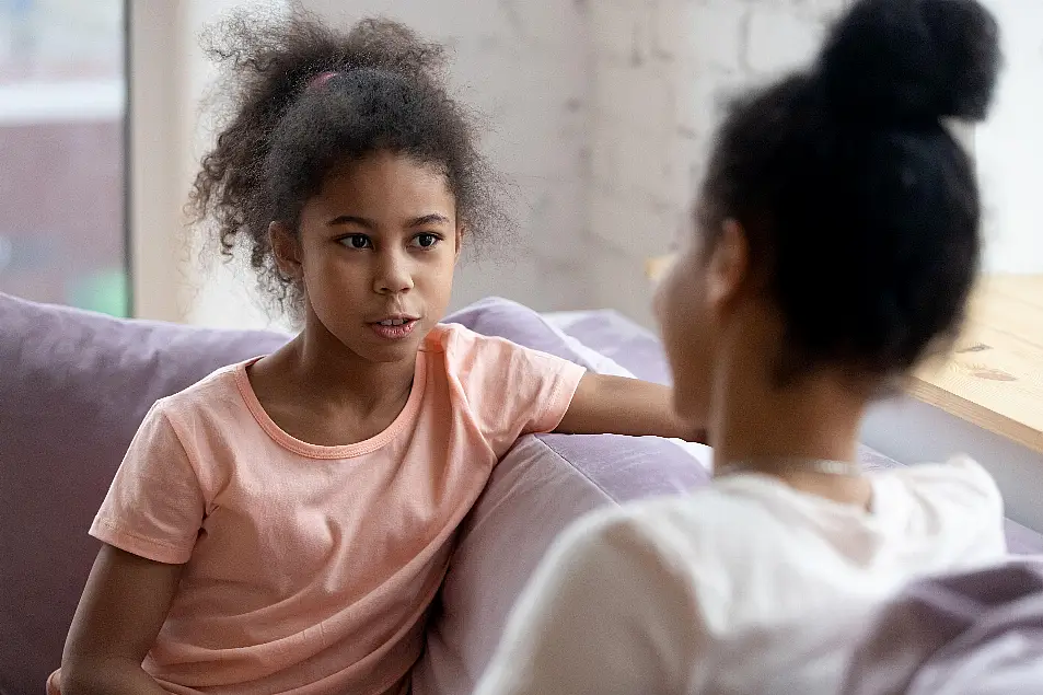 Mother and daughter having an open conversation