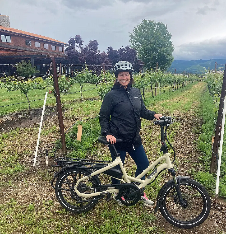 Abi Jackson with an e-bike at Mt Hood Winery