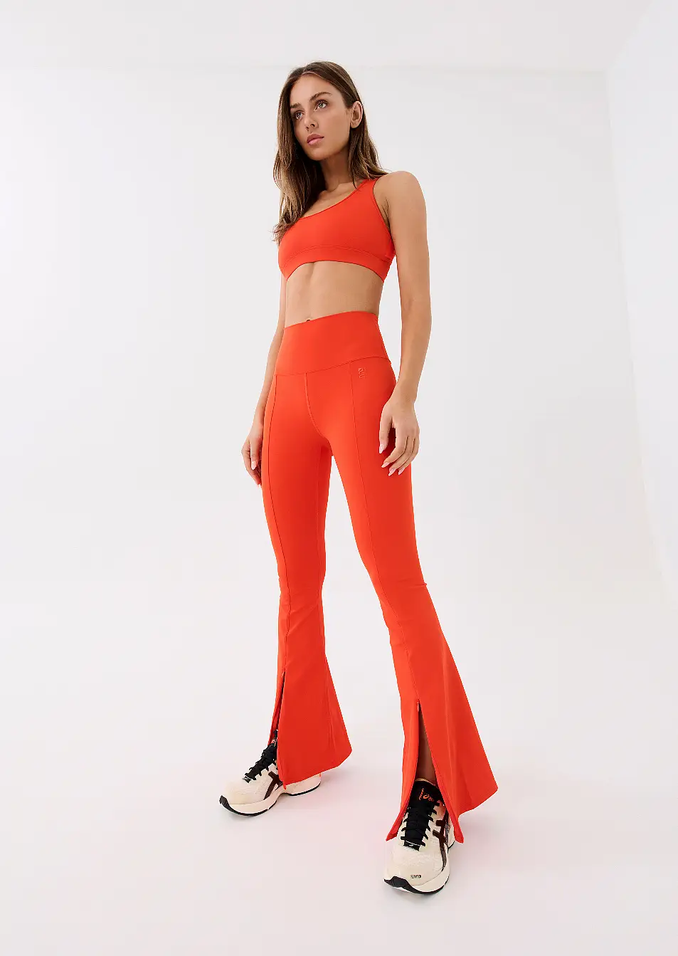 PE Nation Rudimental Sports Bra in Cherry Tomato; Full Force Leggings in Cherry Tomato