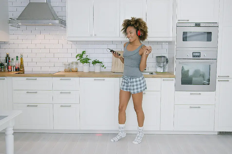 woman dancing in kitchen