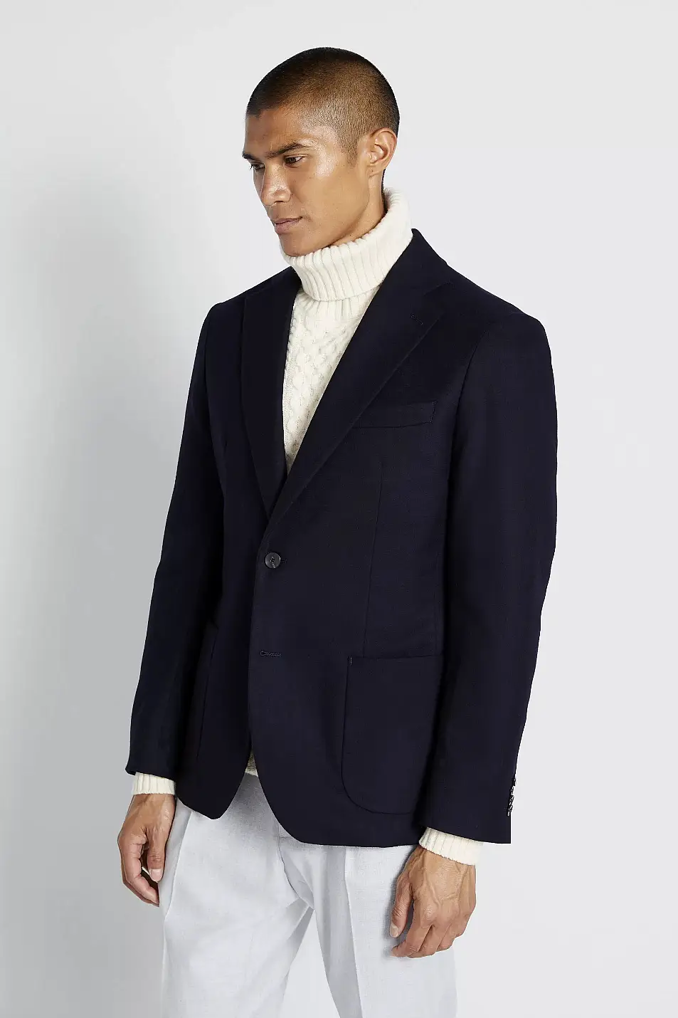 Moss Bros Navy Wool Jacket; Grey Chunky Cable Roll Neck Jumper; Slim Fit Stone Puppytooth Trousers