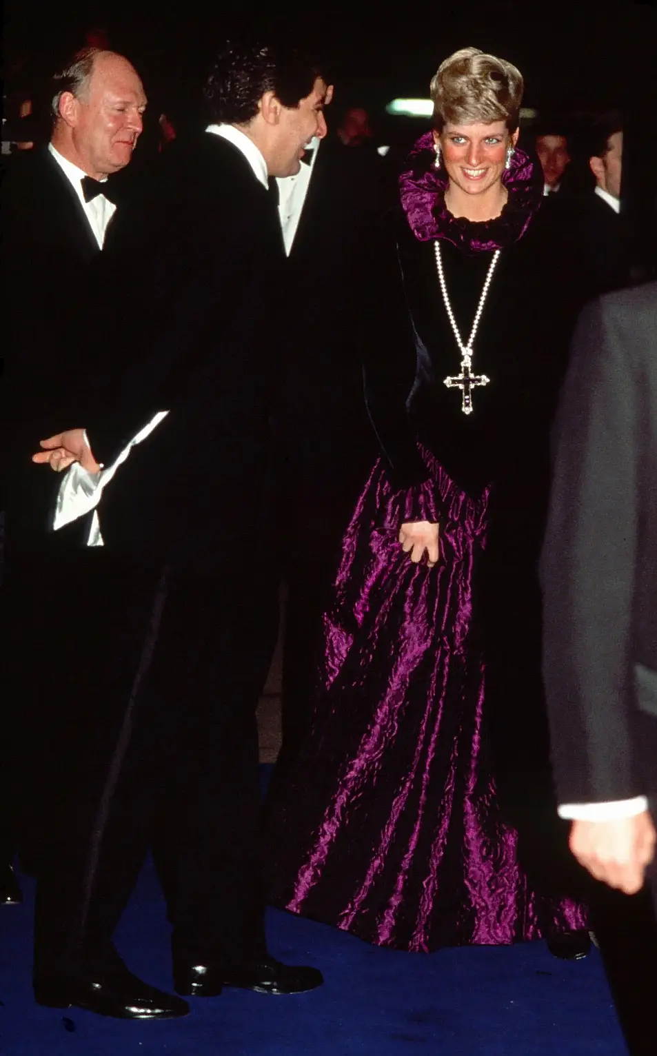 Diana attends charity gala in Elizabethan style dress and cross necklace 