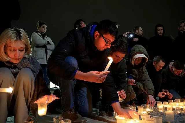 People light candles