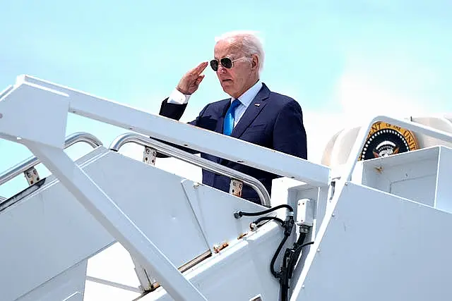 Biden salutes 