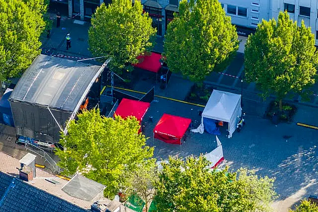 Red tents in a town square