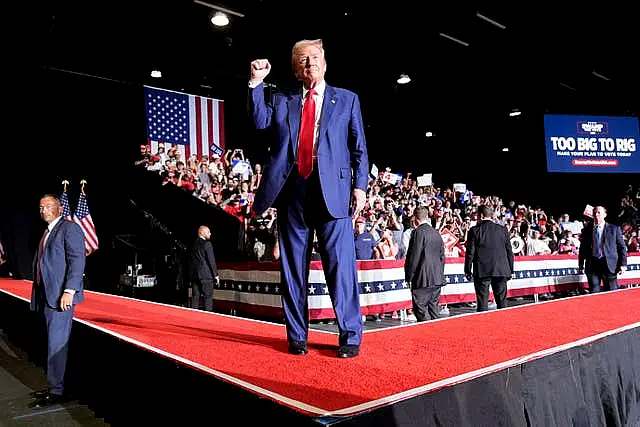 Republican presidential nominee Donald Trump departs after speaking during a campaign event at the World Market Centre in Las Vegas