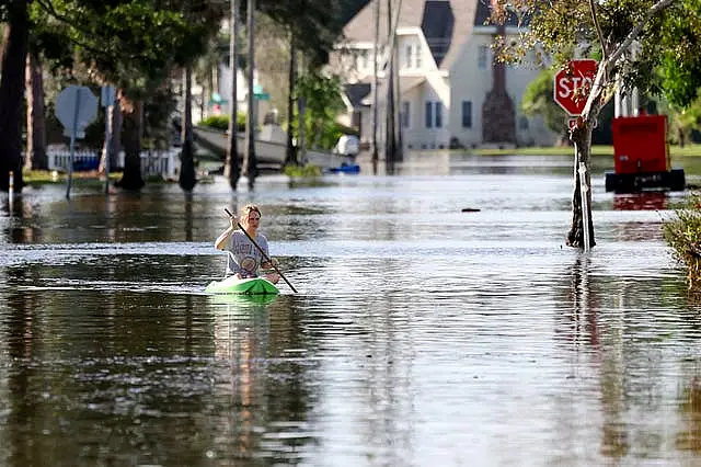 A street flooded by Hurricane Helene (Mike Carlson/AP)