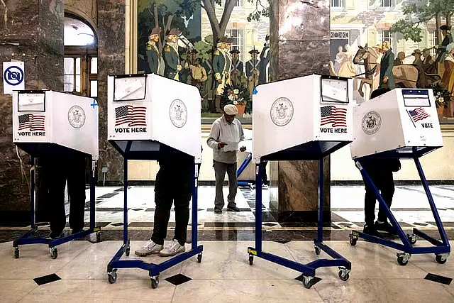 Voters cast their ballots at the Bronx County Supreme Court in New York on Election Day