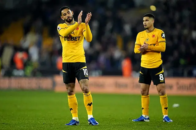 Wolves players applaud their fans