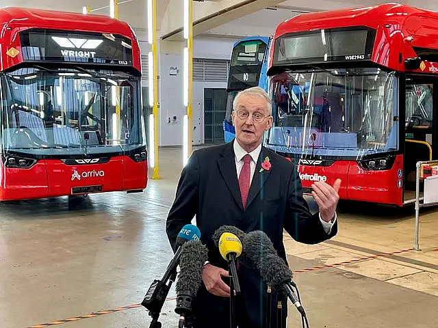 Northern Ireland Secretary Hilary Benn speaks to the media at the Wrightbus factory in Ballymena