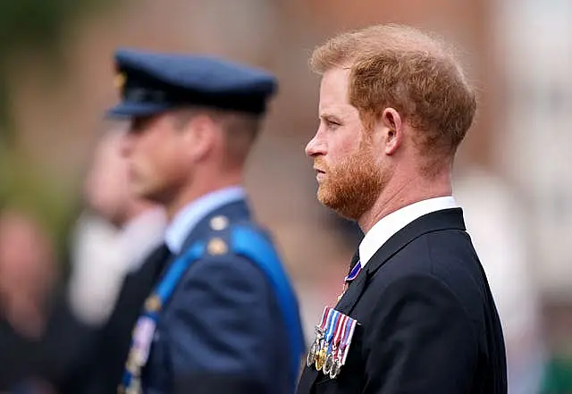 The Prince of Wales and the Duke of Sussex, in the Ceremonial Procession following her State Funeral at Westminster Abbey, London